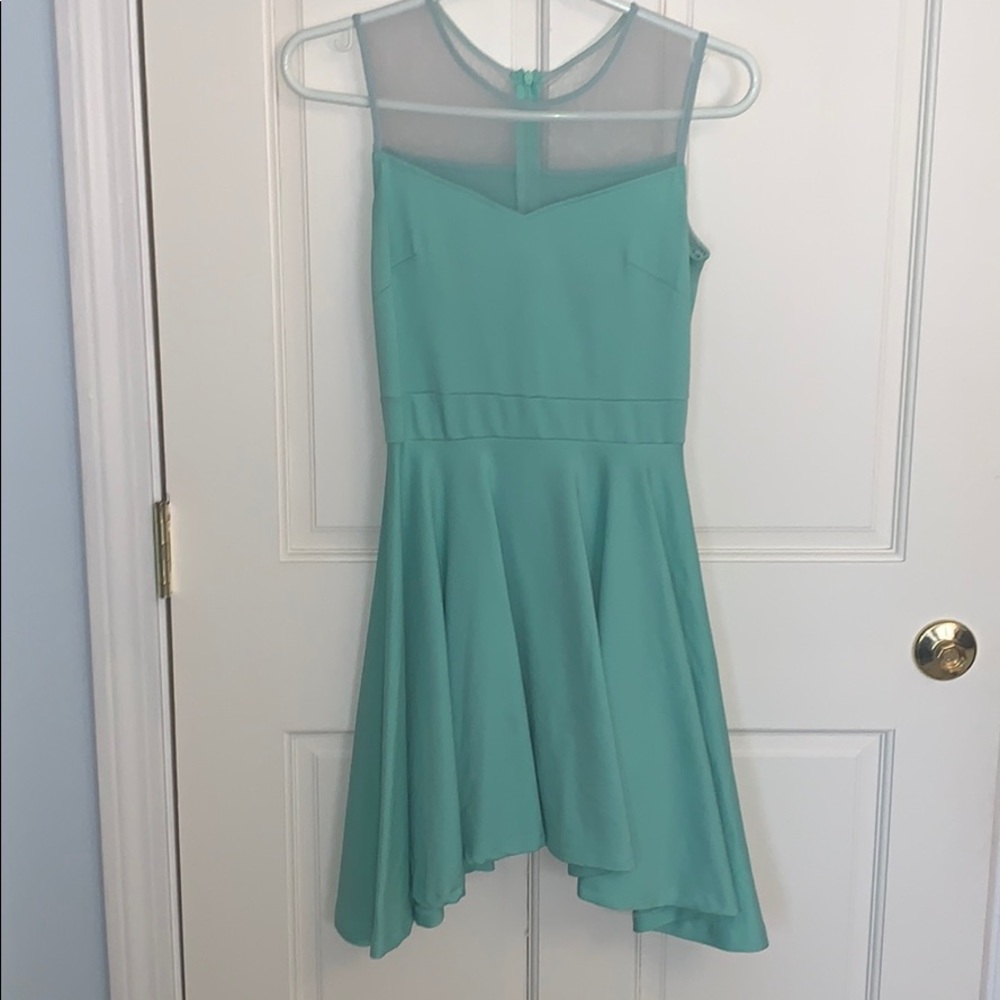 Very cute fit and flare teal mesh top dress
